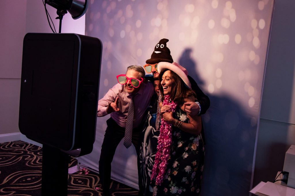 In The Mix Event Group wedding photo booth setup with props, backdrops, instant prints, and digital sharing included in every package.