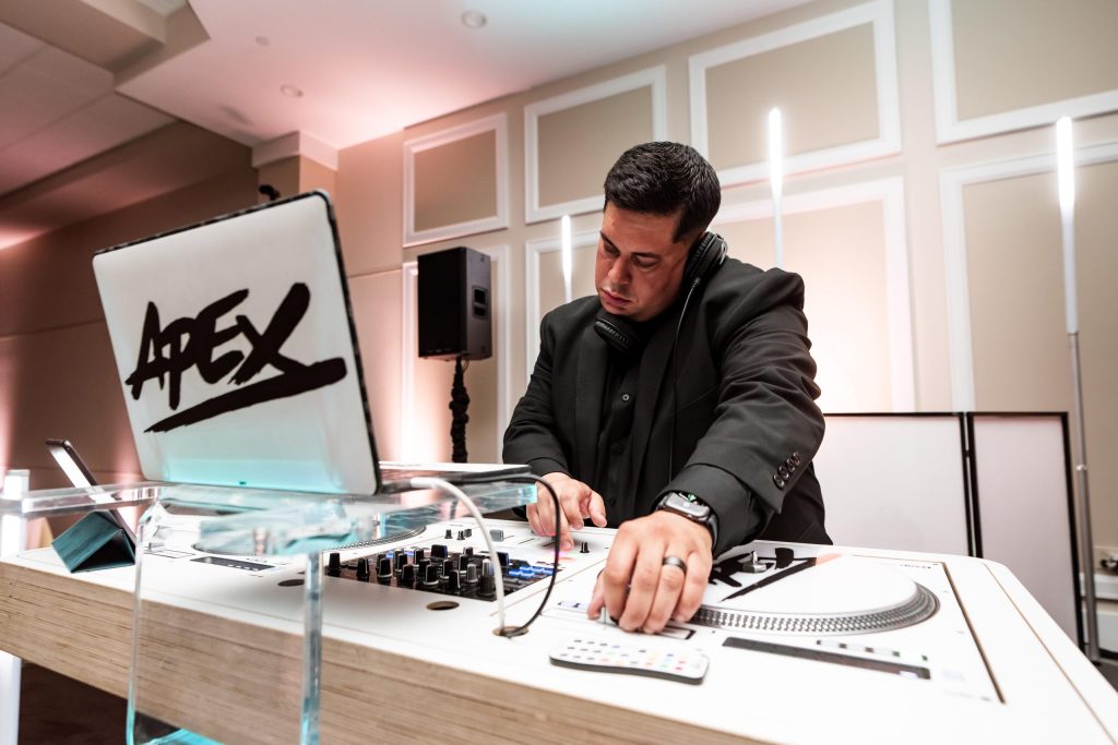 Wedding DJ services by In The Mix Event Group — professional DJ keeping the dance floor packed and energy high all night long.
